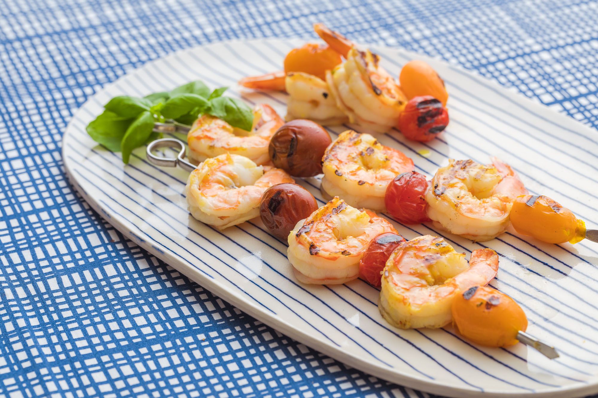 Cooking recipes: grilled-shrimp-skewers cooked with Bertolli olive oil. Extra Virgin Olive Oil.