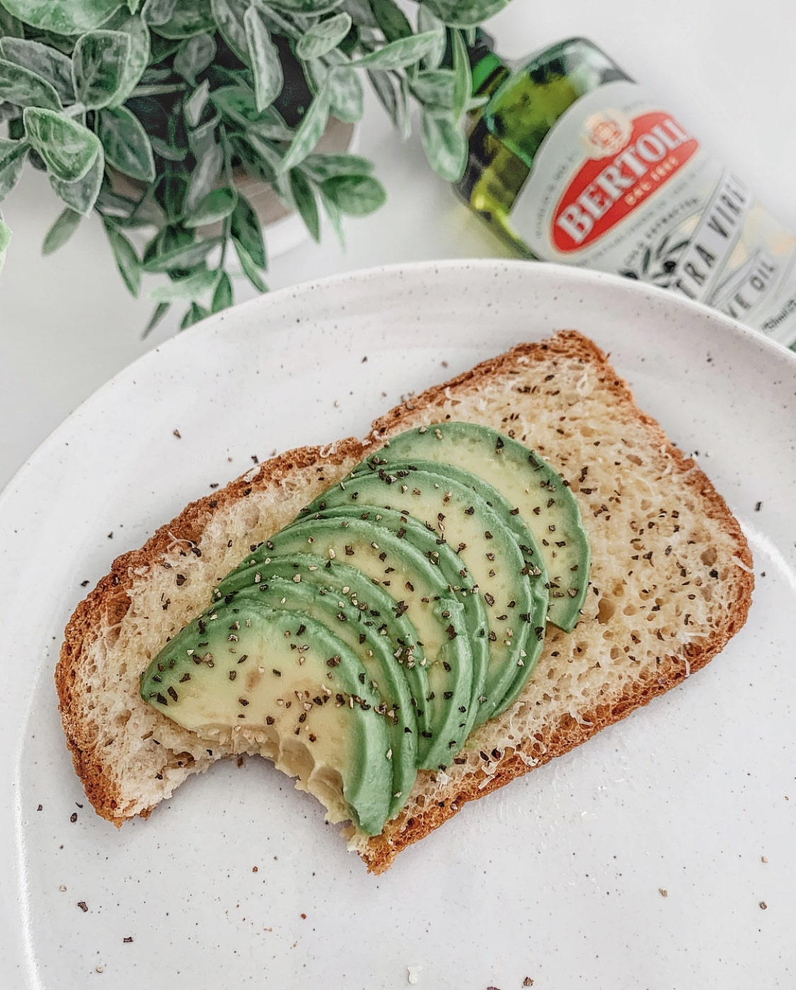 Cheesy Avocado Toast with organic Bertolli Olive Oil