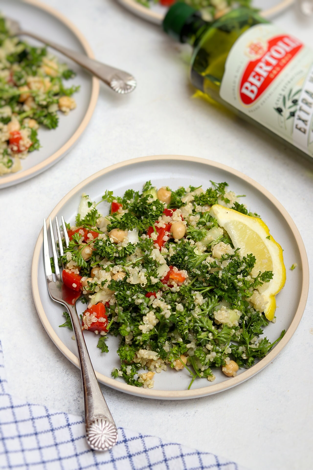 Quinoa Tabbouleh Salad represents Bertolli quality olive oil.