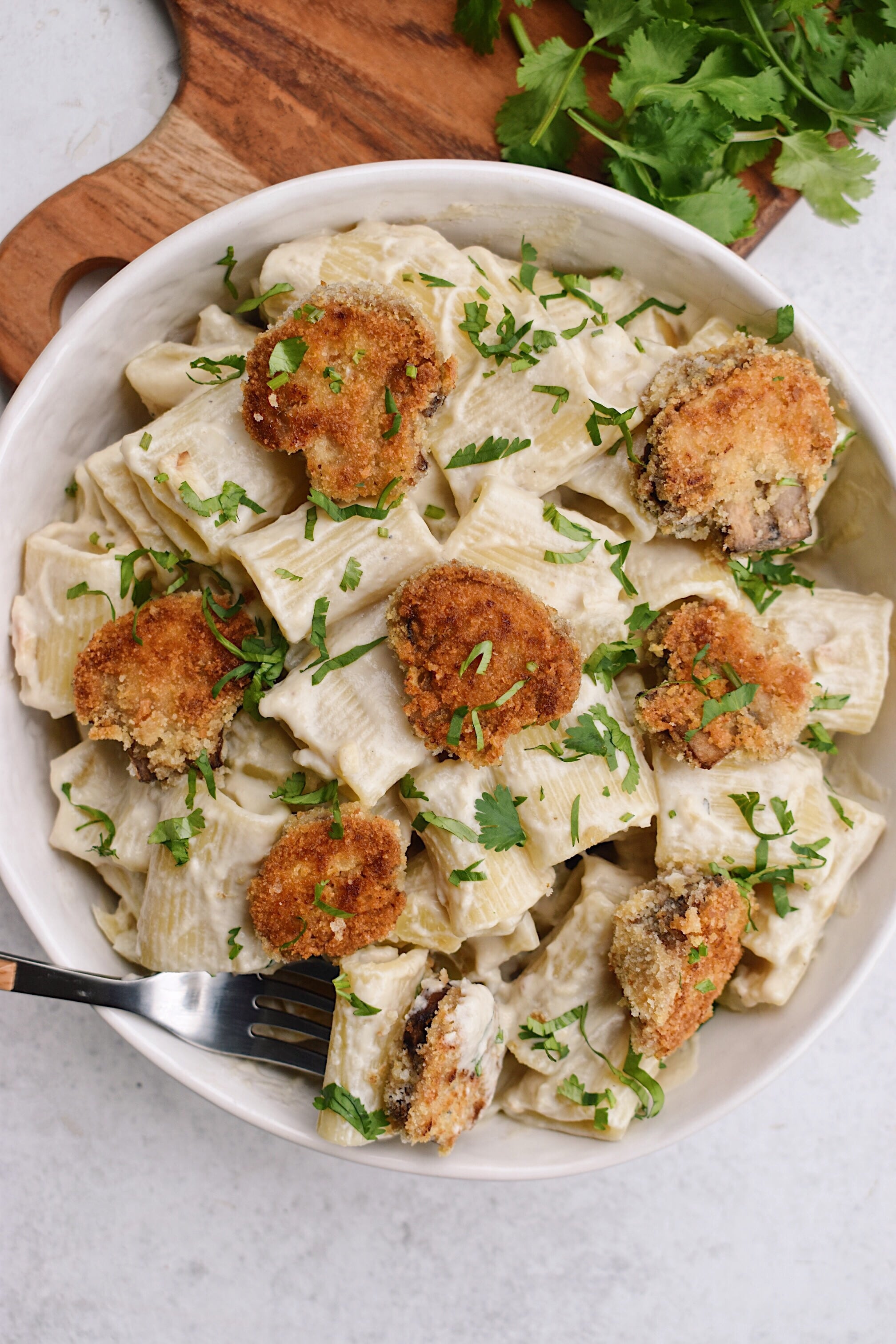 Crispy Mushroom Vegan Alfredo Pasta representng easy italian recipes.